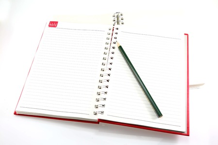 pencil on blank notebook.の写真素材