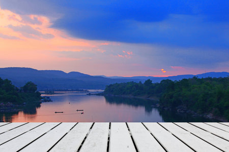Beautiful  the morning sun  with empty woodenの写真素材