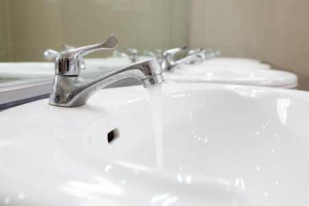 Basin in washroom interior の写真素材