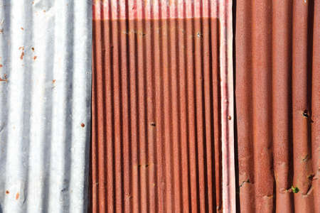 Old damage rusty zinc plat wallの写真素材