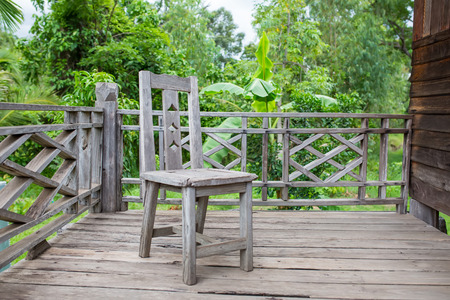 chair and floor of old Thai houseの写真素材