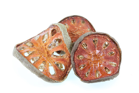 Dried quince . traditional chinese herbal medicine,  on white background closeupの写真素材
