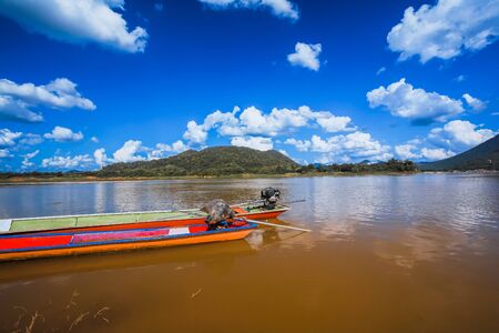 The boat, passenger boat, speed boat, passenger boat on the Mekong River countries of Thailand.の写真素材