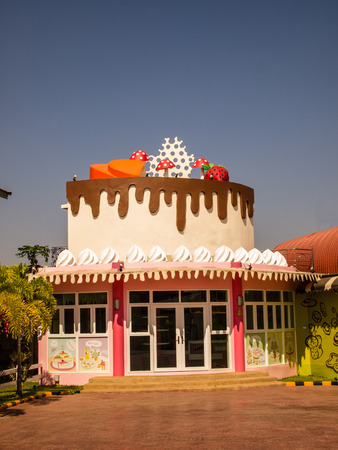 House shaped pink and white cake and eatのeditorial素材