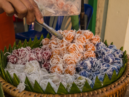 Coconut slices placed on Godis colors.の写真素材