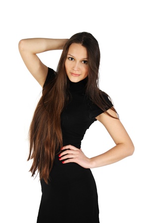 beautiful girl wearing black dress smiles isolated on white backgroundの写真素材