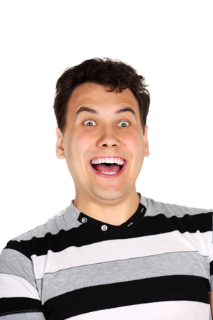 Portrait of brunet handsome laughing man isolated on white background.の写真素材