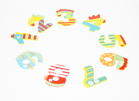 Round of colorful numbers isolated on white background 