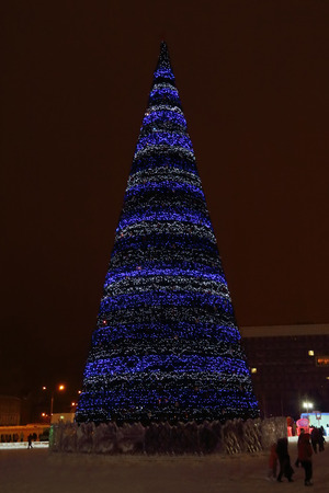 PERM, RUSSIA - JAN 11, 2014: Christmas tree in Ice town at evening. Construction of Ice town of Perm was spent 590 thousand dollars.のeditorial素材