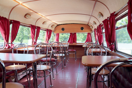 PERM, RUSSIA - JUN 11, 2013: Interior of double-decker bus cafe Kentucky Fried Chicken. First restaurant KFC was opened in 1930のeditorial素材