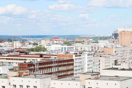 Modern buildings in residential area of big city on hot sunny dayの写真素材