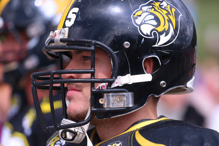 PERM, RUSSIA - JUN 12, 2015: Young rugby player in helmet at street during day of Russiaのeditorial素材
