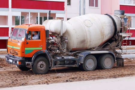 PERM, RUSSIA - MAY 15, 2015: Concrete mixer on construction site of largest builder of Perm - Factory of silicate panelsのeditorial素材