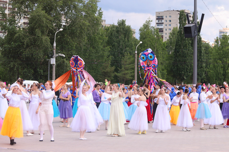 PERM, RUSSIA - JUN 12, 2015: Dancers in dresses on street show during day of Russiaのeditorial素材