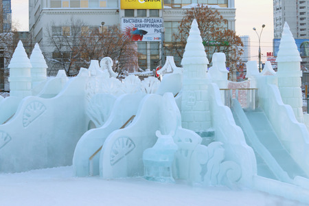 PERM, RUSSIA - JAN 18, 2017: Castle with slides in Perm Ice Town 2017 Ekosad - largest in Russia at dayのeditorial素材