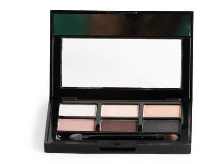 Small palette of eye shadow with natural shades isolated on whiteの写真素材