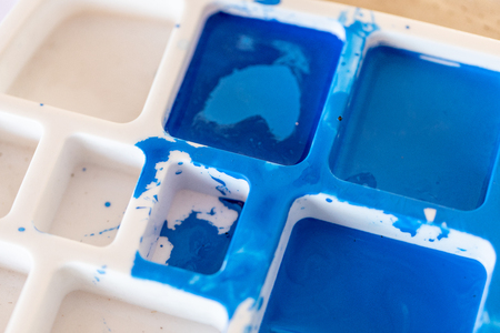 Close up of different color oil paint, Patterns or backgrounds of various colors, colors on the fabric.の写真素材