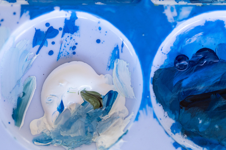 Close up of different color oil paint, Patterns or backgrounds of various colors, colors on the fabric.の写真素材