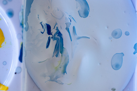 Close up of different color oil paint, Patterns or backgrounds of various colors, colors on the fabric.の写真素材