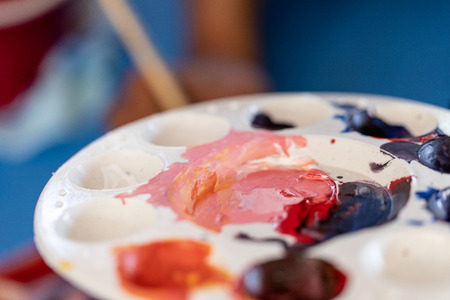 Close up of different color oil paint, Patterns or backgrounds of various colors, colors on the fabric.の写真素材