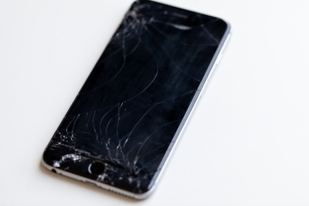 Modern mobile smartphone broken screen and damages.Â 