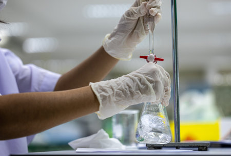 Acid-base reaction titration in Laboratory.
