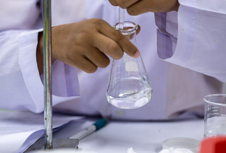 Acid-base reaction titration in Laboratory.