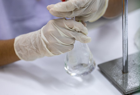 Acid-base reaction titration in Laboratory.