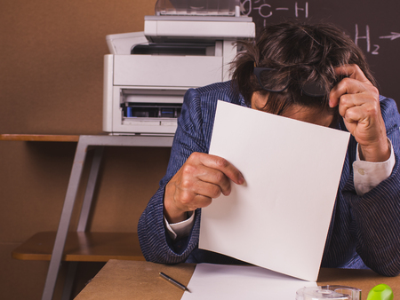 Working in a age is difficult and tiring involving or requiring strenuous effort.の写真素材