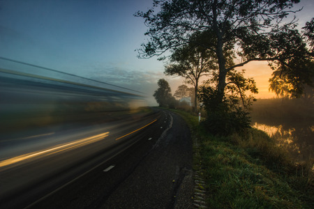 Motion blurred road, early morning in Netherlandsの写真素材