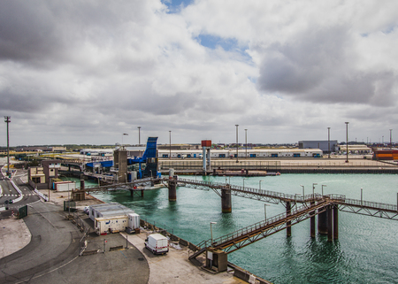 Haven view with cranes of Dover port. Ferry coming in to dock at Dover Port, view into land.の写真素材