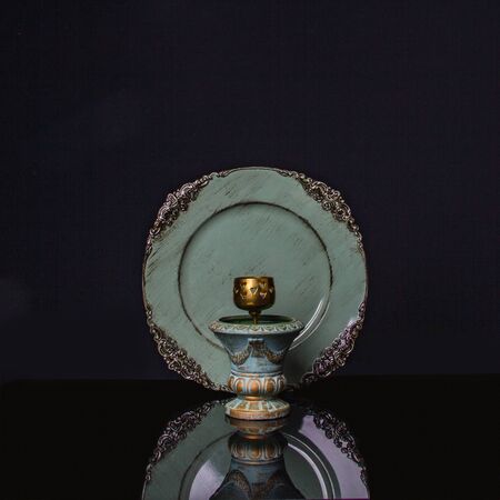 decorative candlestick and  dish with east elementen