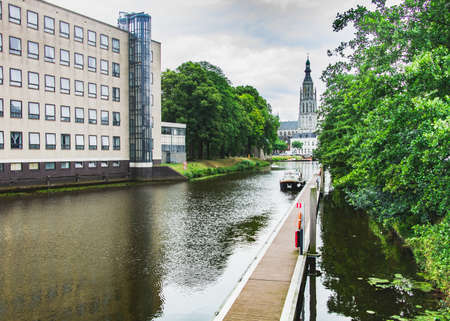 The Grote Kerk or Onze-Lieve-Vrouwekerk (Church of Our Lady) in Breda, view from canal.の写真素材