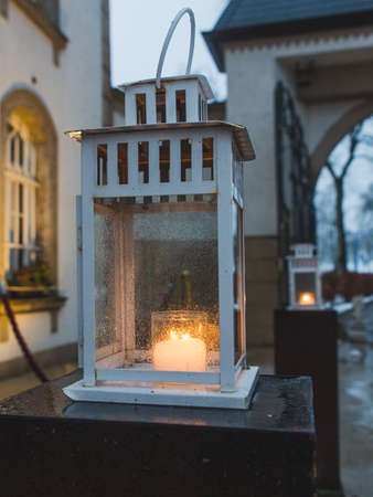 Christmas holiday, hotel, with traditional lantern candlestick, outdoors evening.の写真素材