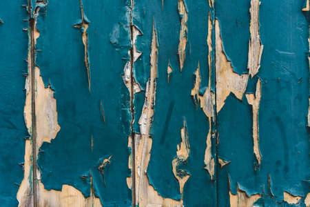 Rough wooden texture of surface blue painted doorの写真素材