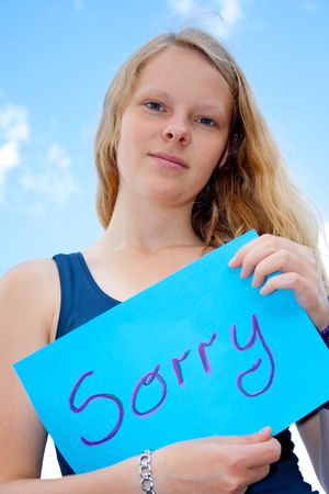 Women show shield: Sorry