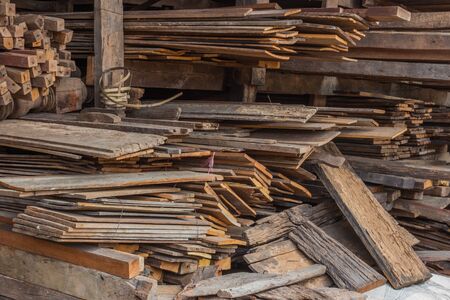 pile of recycle old wooden plank