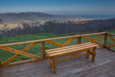 wooden bench on balcony at scenery point , showashinzan mountain, japanの写真素材
