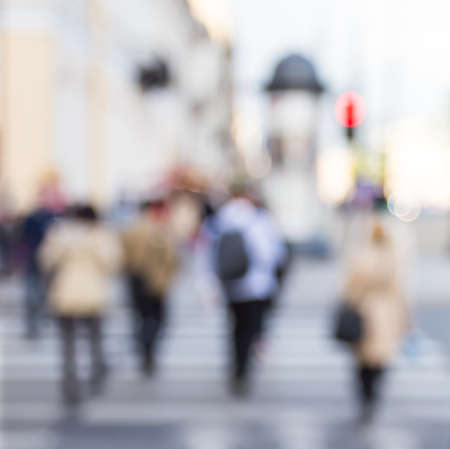 People walking on street in blurの写真素材