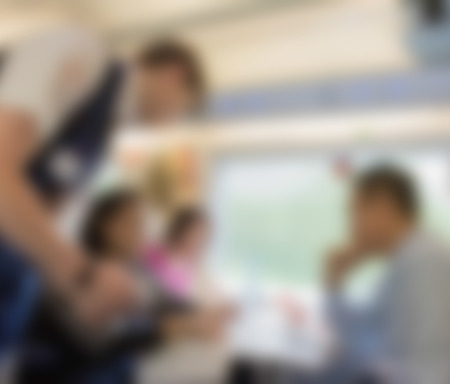 blur ticket collector and  traveler in trainの写真素材