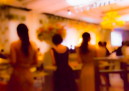blurred  people  in cocktail party at hotel ballroomの写真素材