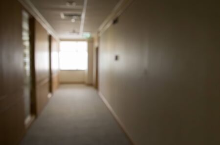 blurred corridor and window in office buildingの写真素材
