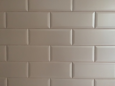 Gray brick wall, brickwork pattern as a background.の素材