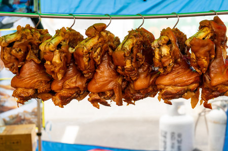 Smoked meat on the street food market in Thailand, Asia.の写真素材