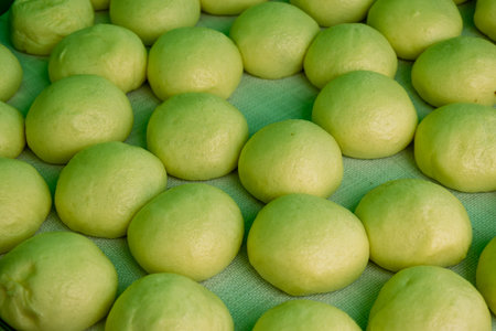 Freshly prepared limes on a green cloth background. Selective focus.の写真素材