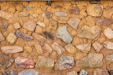 Background of stone wall texture. Closeup of stone wall texture.の写真素材