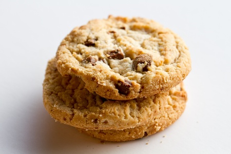 Delicious chocolate chip cookies on white