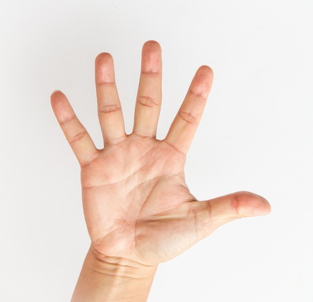 Male hand stretching out on white