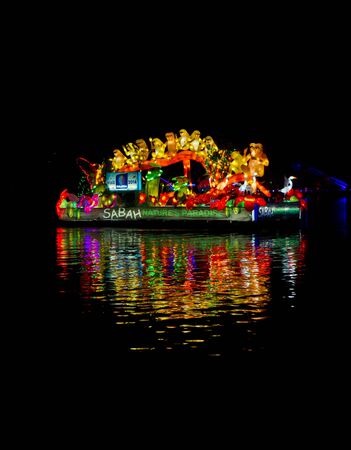 PUTRAJAYA, MALAYSIA- June 2013: Floats cruising at lake during FLORIA night show in Putrajaya, Malaysia, an event to promote tourism Malaysia.のeditorial素材