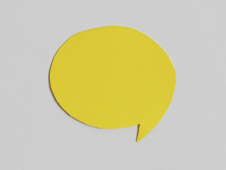 Symbol and concept for talking and message : yellow chat speech icon